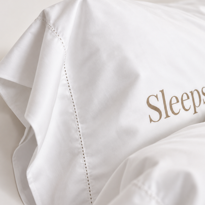 Sleeps With Dogs Cotton Pillowcase